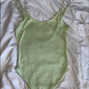 Light green body suit